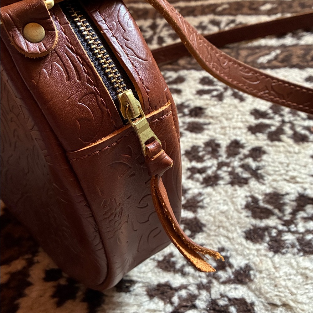 Portland Leather Round Tooled Crossbody Bag in Cognac Brown - Picture 7 of 9